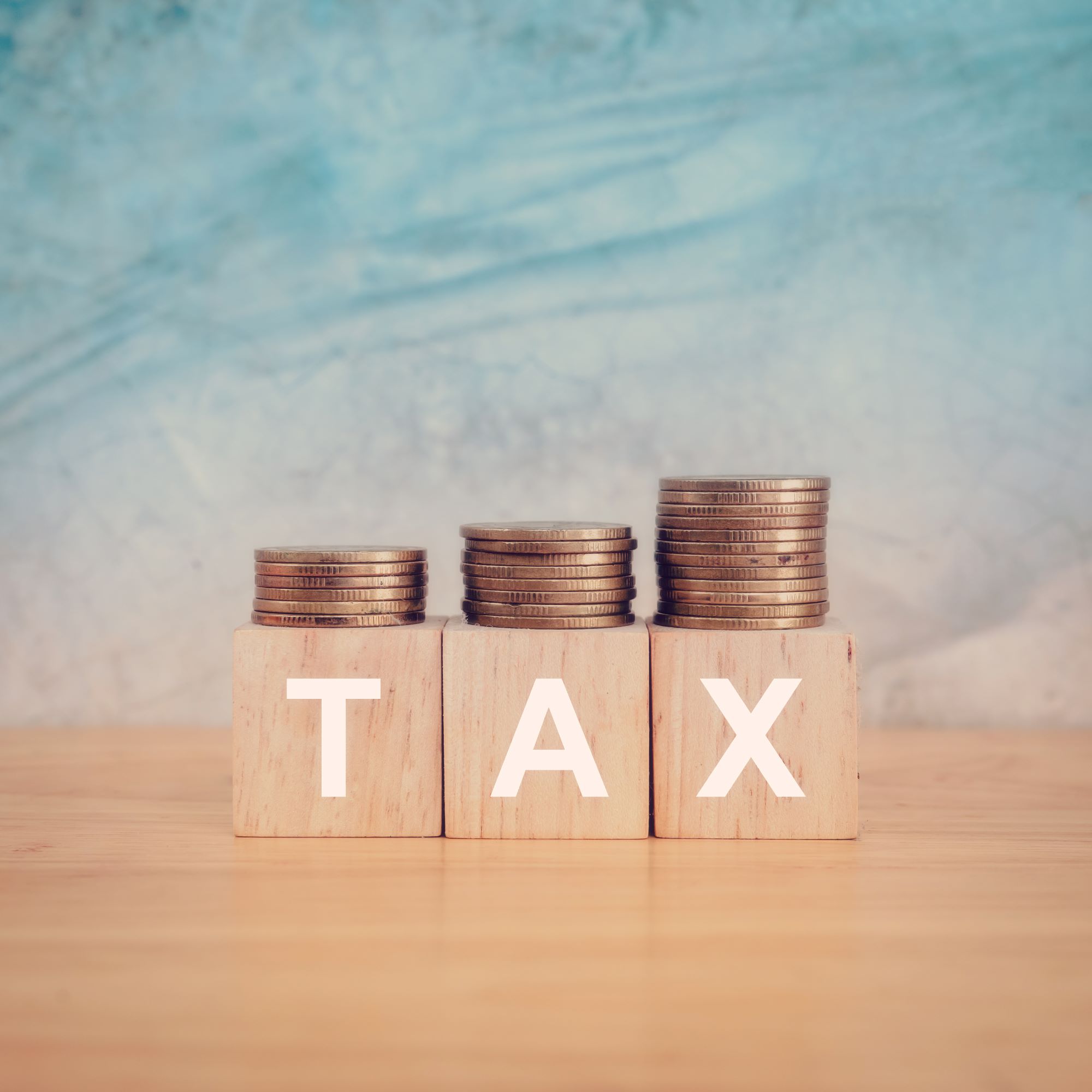 business-concept-wooden-blocks-with-text-tax-table-copy-space1