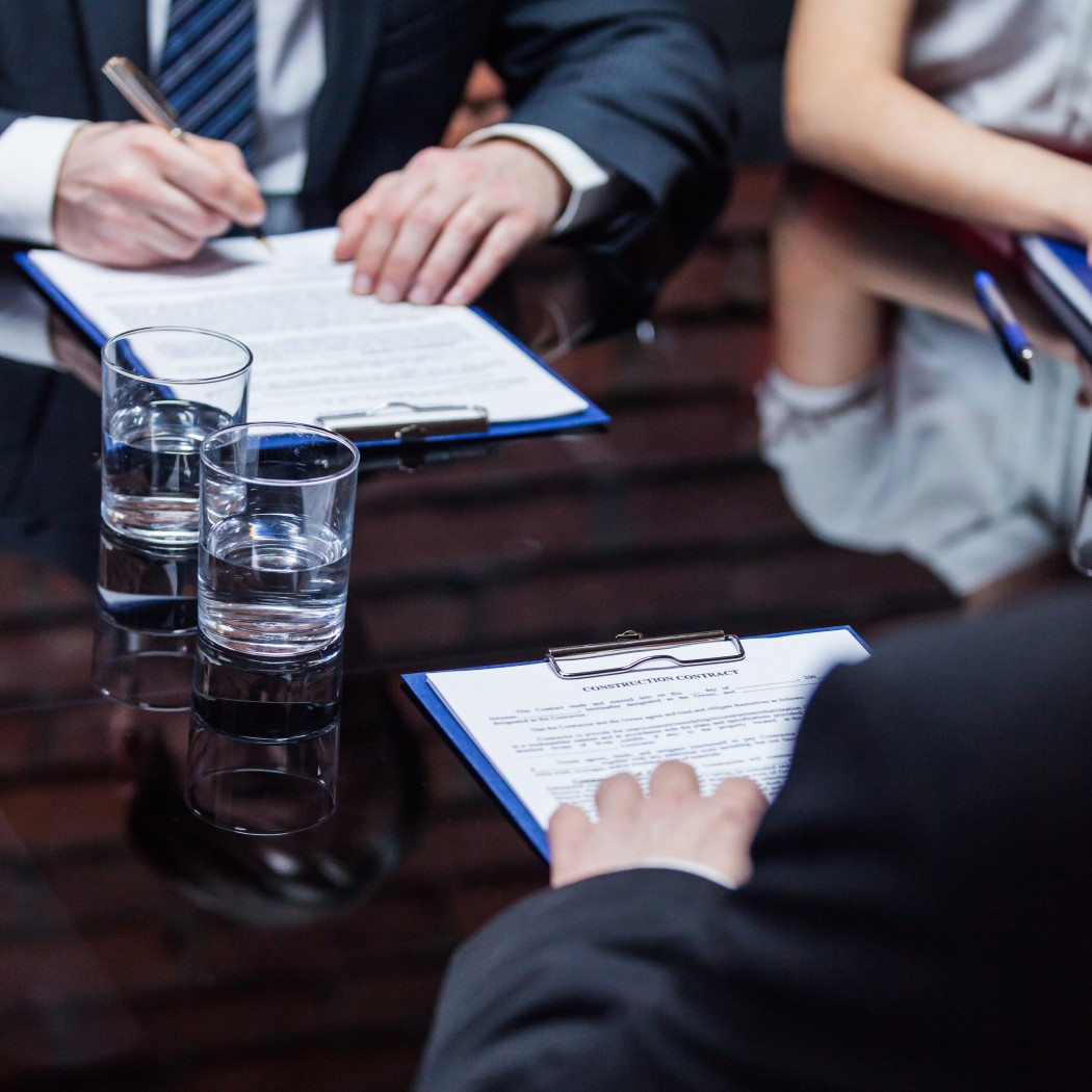 businessmen-giving-signature-documents (1)