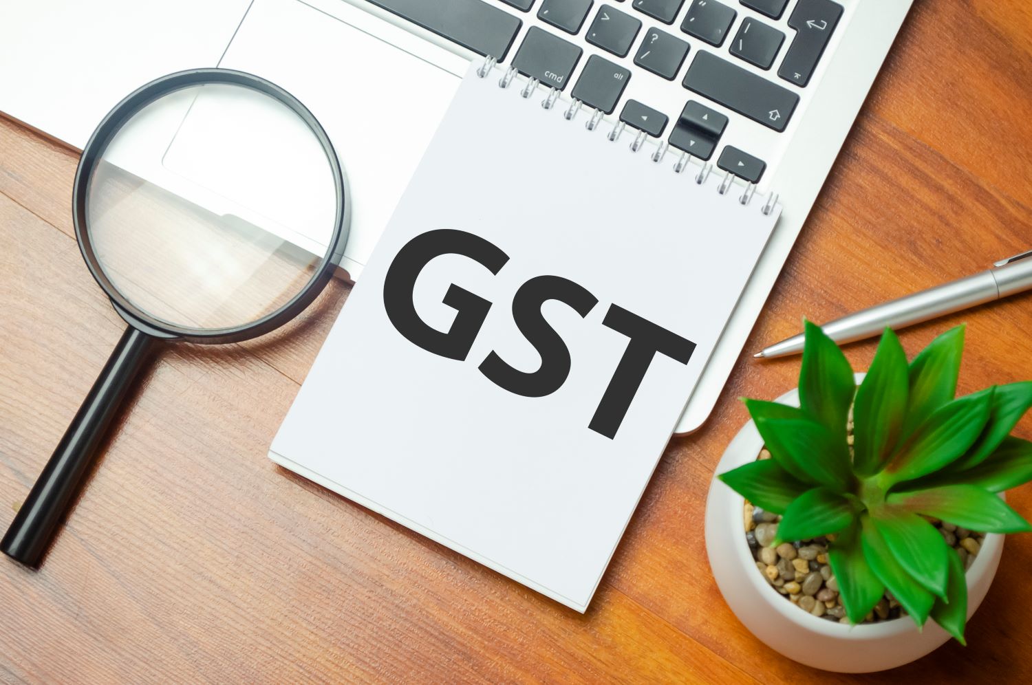 gst-word-notepad-laptop-wooden-1background